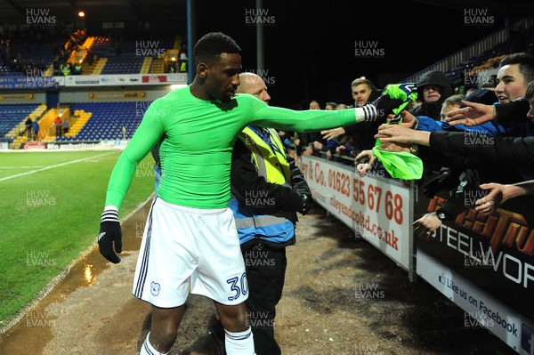 160118 - Mansfield Town v Cardiff City - FA Cup - Omar Bogle of Cardiff City gives his shirt to fans at the end of the game
