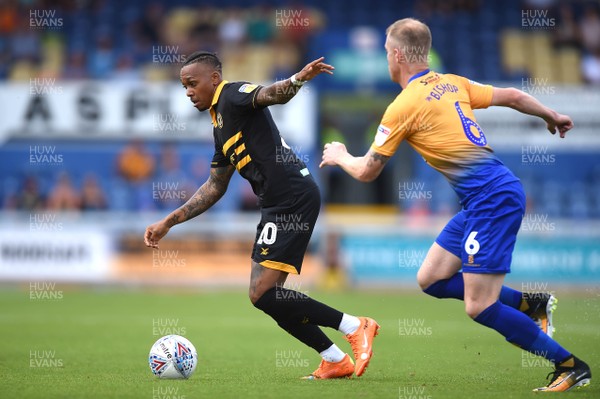040818 - Mansfield Town v Newport County - League 2 - Keanu Marsh-Brown of Newport County and Neal Bishop of Mansfield Town compete