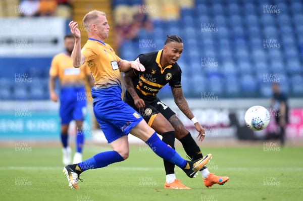 040818 - Mansfield Town v Newport County - League 2 - Keanu Marsh-Brown of Newport County is tackled by Neal Bishop of Mansfield Town