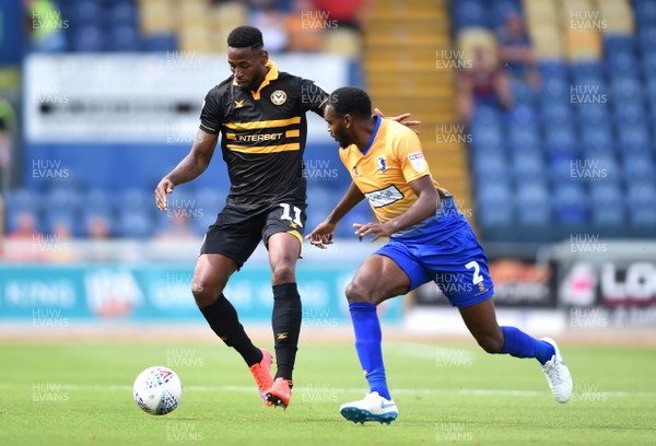 040818 - Mansfield Town v Newport County - League 2 - Jamille Matt of Newport County looks for a way past Hayden White of Mansfield Town