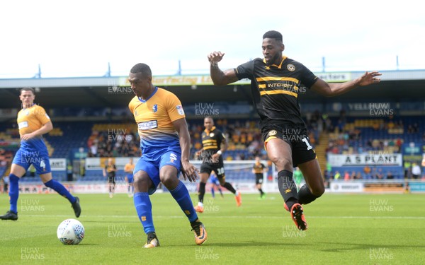 040818 - Mansfield Town v Newport County - League 2 - Krystian Pearce of Mansfield Town and Jamille Matt of Newport County compete