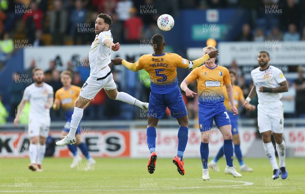 120519 - Mansfield Town v Newport County, Sky Bet League 2 Play Off Semi Final, second leg - Robbie Willmott of Newport County and Krystian Pearce of Mansfield Town compete for the ball