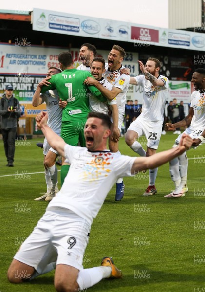 120519 - Mansfield Town v Newport County, Sky Bet League 2 Play Off Semi Final, second leg - Newport County players celebrate winning the penalty shoot out and heading to Wembley for the League 2 Play Off Final