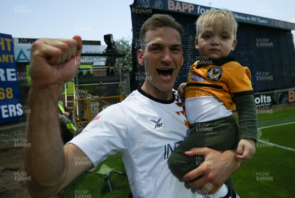 120519 - Mansfield Town v Newport County, Sky Bet League 2 Play Off Semi Final, second leg - Mickey Demetriou of Newport County celebrate with his son after winning the penalty shoot out and heading to Wembley for the League 2 Play Off Final