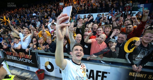 120519 - Mansfield Town v Newport County, Sky Bet League 2 Play Off Semi Final, second leg - Matty Dolan of Newport County celebrates with the fans after winning the penalty shoot out and heading to Wembley for the League 2 Play Off Final