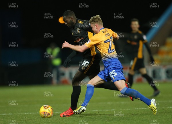 130218 - Mansfield Town v Newport County, Sky Bet League 2 - Frank Nouble of Newport County is challenged by Adam King of Mansfield Town