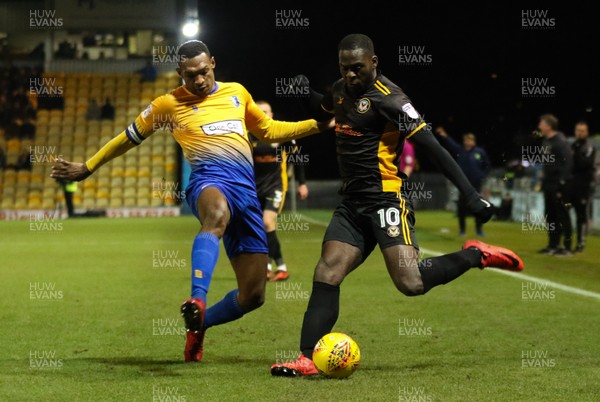 130218 - Mansfield Town v Newport County, Sky Bet League 2 - Frank Nouble of Newport County is challenged by Krystian Pearce of Mansfield Town