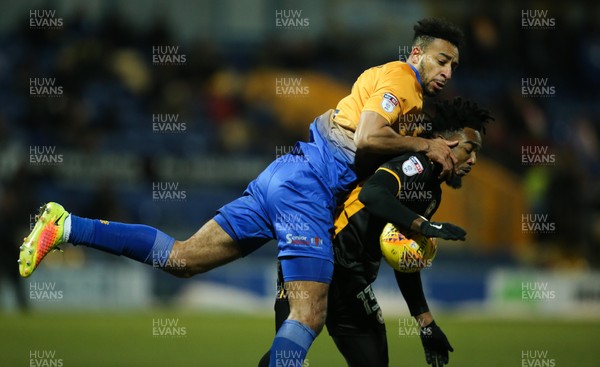 130218 - Mansfield Town v Newport County, Sky Bet League 2 - Rhys Bennett of Mansfield Town puts pressure on Marlon Jackson of Newport County as they compete for the ball