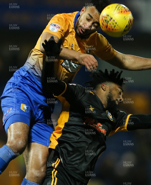 130218 - Mansfield Town v Newport County, Sky Bet League 2 - Rhys Bennett of Mansfield Town puts pressure on Marlon Jackson of Newport County as they compete for the ball