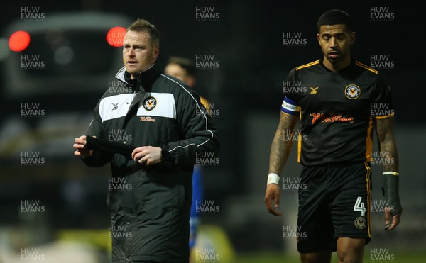 130218 - Mansfield Town v Newport County, Sky Bet League 2 - Newport County manager Michael Flynn and Joss Labadie of Newport County leave the pitch at the end of the match