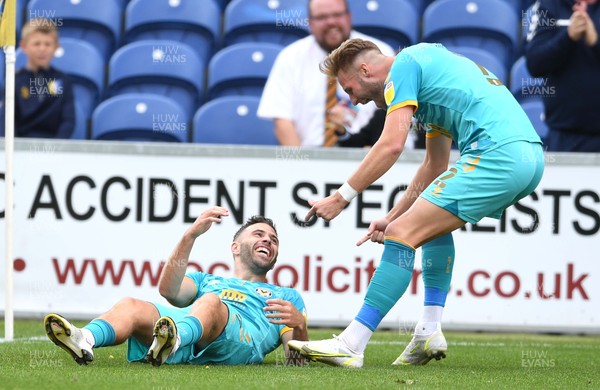 140821 - Mansfield Town v Newport County - EFL SkyBet League 2 - Robbie Willmott of Newport County celebrates scoring goal with Cameron Norman (right)