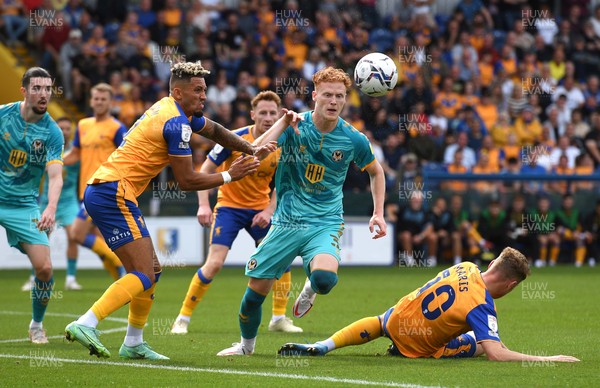 140821 - Mansfield Town v Newport County - EFL SkyBet League 2 - Ryan Haynes of Newport County is tackled by Kellan Gordon of Mansfield Town