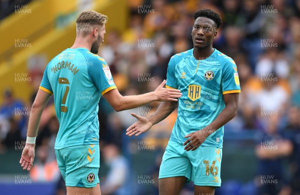 140821 - Mansfield Town v Newport County - EFL SkyBet League 2 - Timmy Abraham of Newport County and Cameron Norman of Newport County