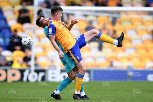 140821 - Mansfield Town v Newport County - EFL SkyBet League 2 - Priestley Farquharson of Newport County is tackled by Oliver Hawkins of Mansfield Town