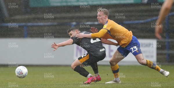 150220 - Mansfield Town v Newport County - Sky Bet League 2 -Taylor Maloney of Newport County and Harry Charsley of Mansfield Town 
