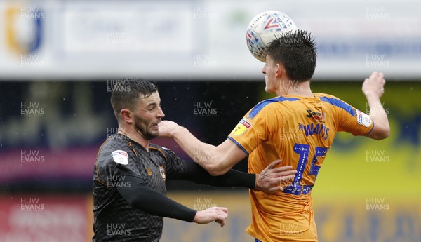 150220 - Mansfield Town v Newport County - Sky Bet League 2 - Kelland Watts of Mansfield Town and Padraig Amond of Newport County