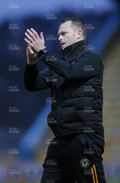 150220 - Mansfield Town v Newport County - Sky Bet League 2 - Manager Mike Flynn of Newport County applauds the away fans at the end of the match