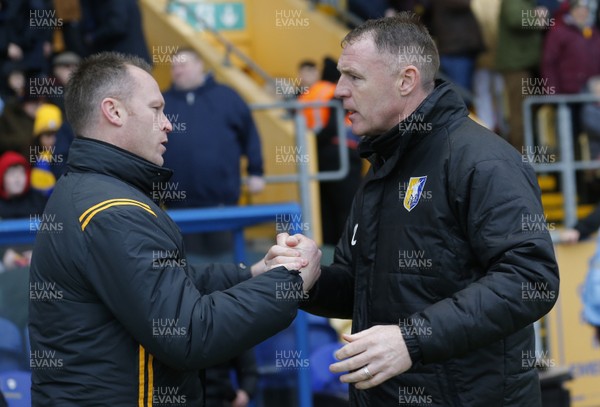 150220 - Mansfield Town v Newport County - Sky Bet League 2 - Manager Graham Coughlan of Mansfield Town greets Manager Mike Flynn of Newport County before the start of the match