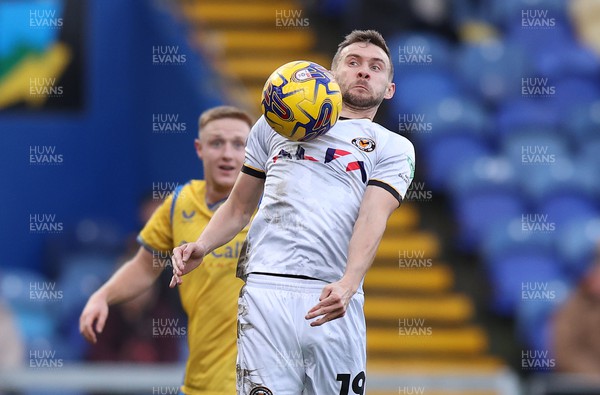 181123 - Mansfield Town v Newport County - Sky Bet League 2 - Shane McLoughlin of Newport County and David Keillor-Dunn of Mansfield Town