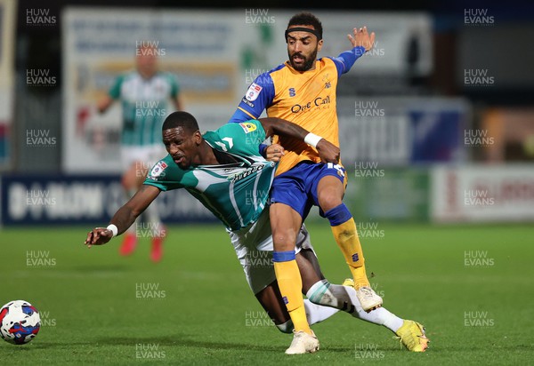 251022 - Mansfield Town v Newport County - Sky Bet League 2 - Omar Bogle of Newport County is fouled just outside the box by James Perch of Mansfield Town who gets a second yellow card and is sent off