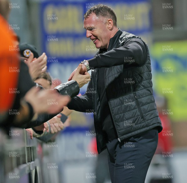 251022 - Mansfield Town v Newport County - Sky Bet League 2 - Manager Graham Coughlan of Newport County salutes the fans at the end of the match