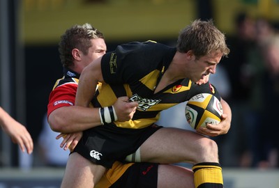 02.08.08 -  Men of Gwent 7's, Rodney Parade. Semi-Finals Newport v Dragons Acadamy -  Newports Tom Isaacs is held by James Thomas 