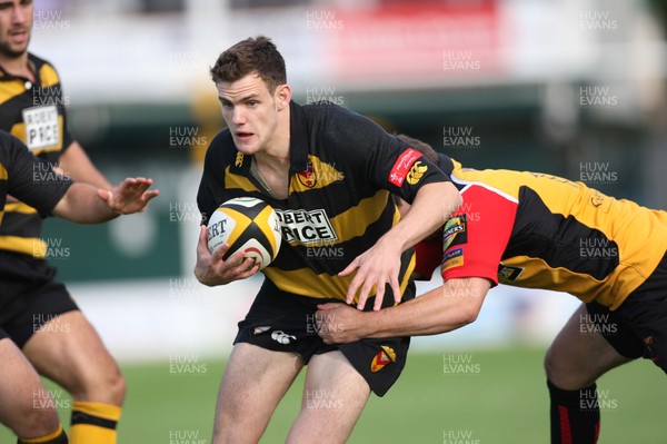 02.08.08 -  Men of Gwent 7's, Rodney Parade. Semi-Finals Newport v Dragons Acadamy -  Newports Mike Poole takes on Adam Hughes 