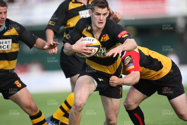 02.08.08 -  Men of Gwent 7's, Rodney Parade. Semi-Finals Newport v Dragons Acadamy -  Newports Mike Poole takes on Adam Hughes 