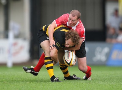 02.08.08 -  Newport v Cross Keys, Men of Gwent 7's FINAL, Rodney Parade- Newport's Andrew Quick is held by Cross Keys Owen Jones 