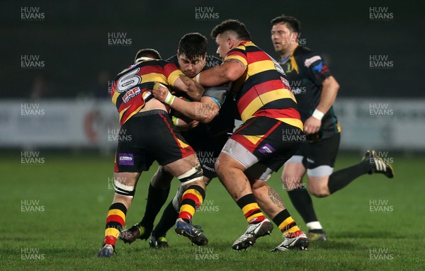 150317 - Merthyr RFC v Carmarthen Quins - Foster's Cup Semi Final - Nick White of Merthyr is tackled by Elis Huw Lloyd and Javan Sebastian of Carmarthen