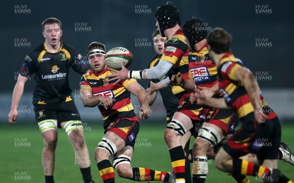 150317 - Merthyr RFC v Carmarthen Quins - Foster's Cup Semi Final - Elis Huw Lloyd of Carmarthen passes the ball