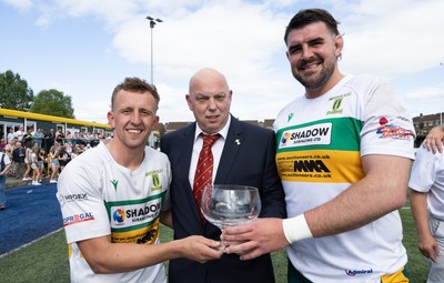 030525 - Merthyr RFC v Neath RFC, WRU Admiral Premiership - Merthyr captains Ben Jones and Paddy McBride are presented with the trophy by WRU representative Roy Wilkinson as Merthyr RFC win the Admiral Mens Community Premiership trophy