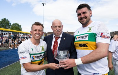 030525 - Merthyr RFC v Neath RFC, WRU Admiral Premiership - Merthyr captains Ben Jones and Paddy McBride are presented with the trophy by WRU representative Roy Wilkinson as Merthyr RFC win the Admiral Mens Community Premiership trophy
