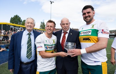030525 - Merthyr RFC v Neath RFC, WRU Admiral Premiership - Merthyr captains Ben Jones and Paddy McBride, joined by Sir Stanley Thomas, are presented with the trophy by WRU representative Roy Wilkinson as Merthyr RFC win the Admiral Mens Community Premiership trophy