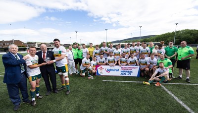 030525 - Merthyr RFC v Neath RFC, WRU Admiral Premiership - Merthyr captains Ben Jones  and Paddy McBride, joined by Sir Stanley Thomas, are presented with the trophy by WRU representative Roy Wilkinson as Merthyr RFC celebrate winning the Admiral Mens Community Premiership trophy