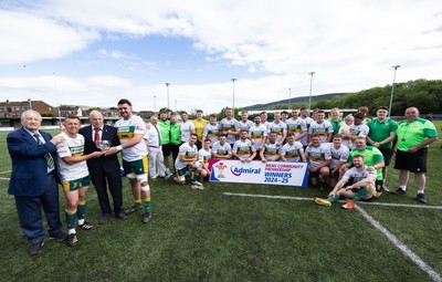 030525 - Merthyr RFC v Neath RFC, WRU Admiral Premiership - Merthyr captains Ben Jones  and Paddy McBride, joined by Sir Stanley Thomas, are presented with the trophy by WRU representative Roy Wilkinson as Merthyr RFC celebrate winning the Admiral Mens Community Premiership trophy