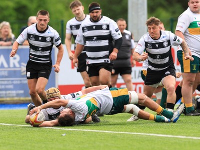 030525 - Merthyr RFC v Neath RFC, WRU Admiral Premiership - Aled Evans of Merthyr reaches over his head to score try