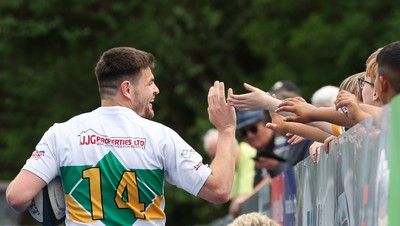 030525 - Merthyr RFC v Neath RFC, WRU Admiral Premiership - Adam Hoskins of Merthyr celebrates with fans after scoring try