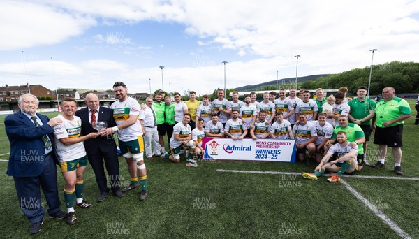 030525 - Merthyr RFC v Neath RFC, WRU Admiral Premiership - Merthyr captains Ben Jones  and Paddy McBride, joined by Sir Stanley Thomas, are presented with the trophy by WRU representative Roy Wilkinson as Merthyr RFC celebrate winning the Admiral Mens Community Premiership trophy