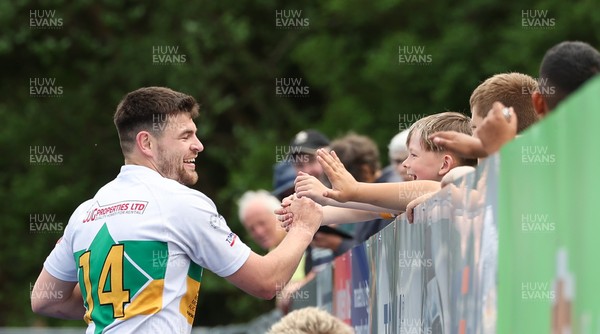 030525 - Merthyr RFC v Neath RFC, WRU Admiral Premiership - Adam Hoskins of Merthyr celebrates with fans after scoring try