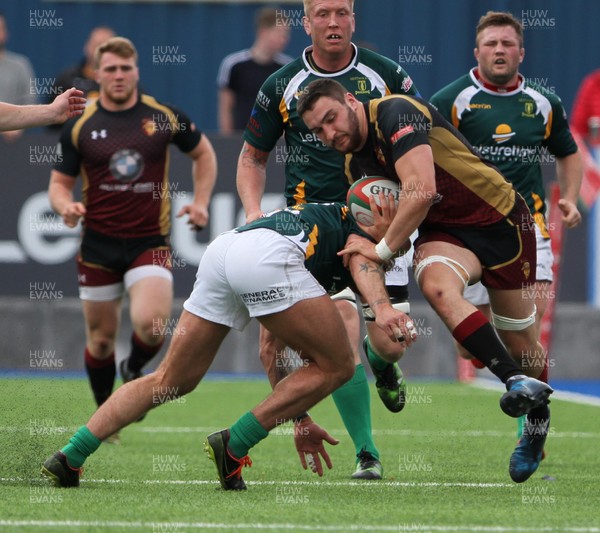 13 05 17 - Merthyr RFC v RGC1404 - Principality premiership Tier 1 Semi Final - Will Bryan of RGC1404 is tackled by Kyle Evans