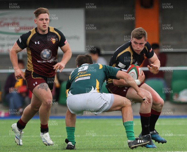 13 05 17 - RGC1404 v Merthyr RFC - Principality Premiership Tier 1 Semi Final - Tom Hughes of RGC1404 is tackled by Rhys Downes of Merthyr RFC