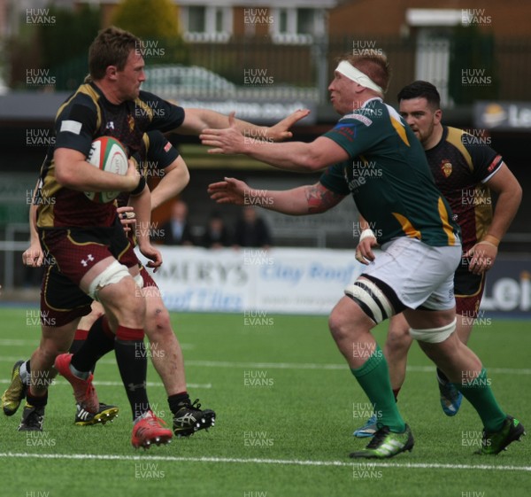 13 05 17 - Merthyr RFC v RGC1404 - Principality premiership Tier 1 Semi Final - Andy Williams of RGC1404 fends off Craig Locke of Merthyr RFC