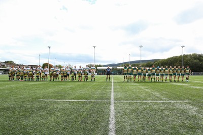 101026 - Merthyr v Beddau - Admiral WRU Premiership - Players of Merthyr and Beddau pay their respects to those lost at Aberfan 60 years ago before kick off 