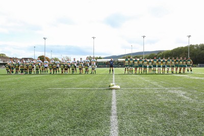 101026 - Merthyr v Beddau - Admiral WRU Premiership - Players of Merthyr and Beddau pay their respects to those lost at Aberfan 60 years ago before kick off 