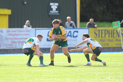 101026 - Merthyr v Beddau - Admiral WRU Premiership - Ewan Roberts of Beddau takes on James Soanes(L) and Jacob Lloyd of Merthyr