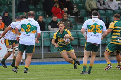 101026 - Merthyr v Beddau - Admiral WRU Premiership - Ioan Leyshon of Beddau takes on Rhys Lewis(3) and Jack Perkins(25) of Merthyr