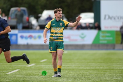 101026 - Merthyr v Beddau - Admiral WRU Premiership - Callaghan Smith of Beddau holds his hand up in apology for a missed goal kick