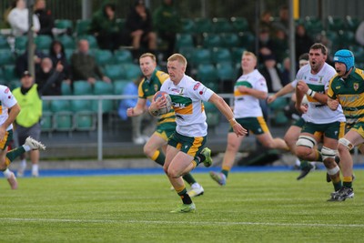 101026 - Merthyr v Beddau - Admiral WRU Premiership - Cole Swannack of Merthyr races in to score a try