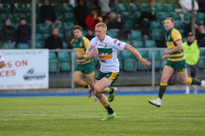 101026 - Merthyr v Beddau - Admiral WRU Premiership - Cole Swannack of Merthyr races in to score a try